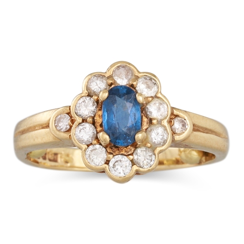 68 - A VINTAGE SAPPHIRE AND DIAMOND CLUSTER RING, mounted in 9ct gold. Size J