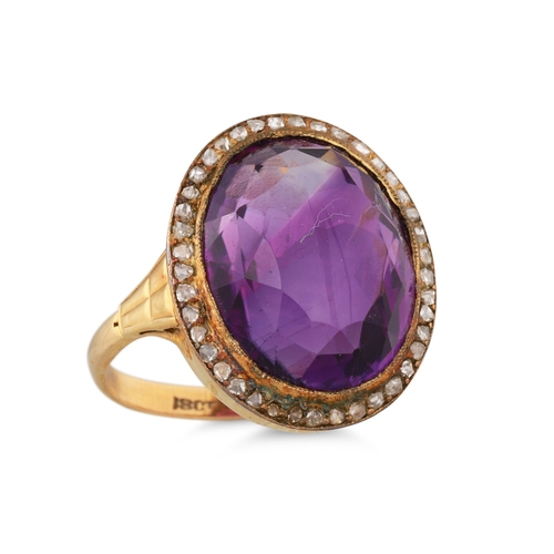 71 - A CABOCHON AMETHYST AND ROSE CUT DIAMOND CLUSTER RING, mounted in 18ct yellow gold. Size: K