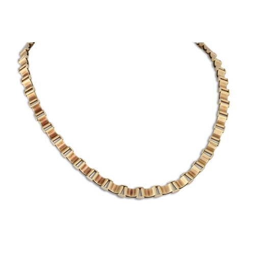 193 - A 9CT GOLD NECKLACE, wave design, 23.8 g. 16