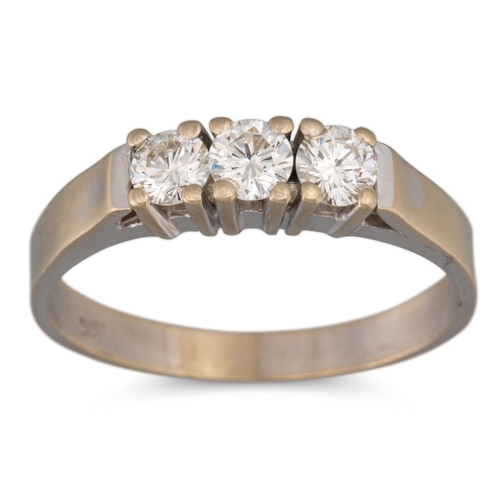 231 - A DIAMOND THREE STONE RING, the round brilliant cut diamonds mounted in 18ct white gold. Estimated: ... 