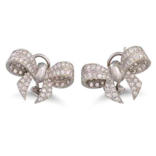 233 - A PAIR OF DIAMOND EARRINGS, pavé set in gold, modelled as bows