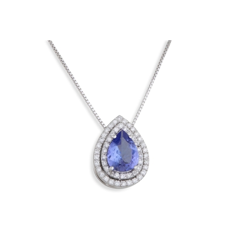 243 - A TANZANITE AND DIAMOND PENDANT, the pear shaped tanzanite to brilliant cut diamond surround, mounte... 