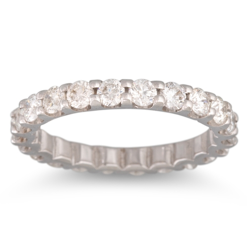 128 - A DIAMOND FULL ETERNITY RING, the brilliant cut diamonds mounted in 18ct white gold. Estimated: weig... 