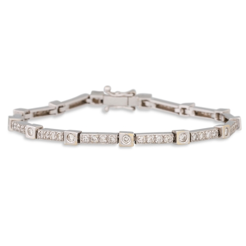 153 - A DIAMOND BRACELET, mounted in 18ct white gold. Estimated: weight of diamonds: 1.30 ct