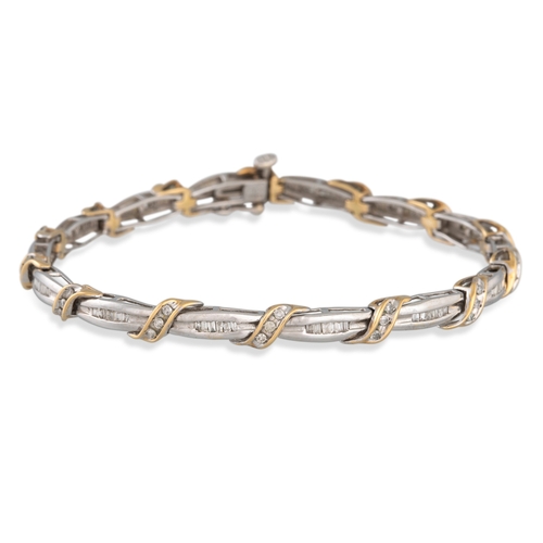 177 - A DIAMOND BRACELET, the channel set diamonds mounted in 10ct white and yellow gold, 9.8 g.