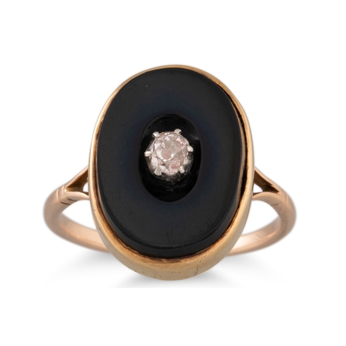 192 - A VINTAGE DIAMOND AND ONYX DRESS RING, mounted in gold, size L