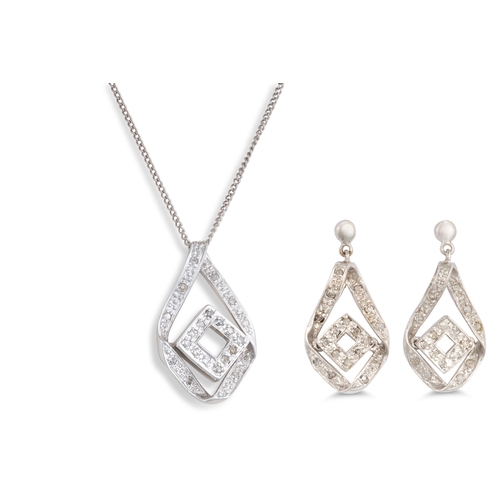 20 - A DIAMOND PENDANT, of shaped form, mounted in white gold, on a chain, together with matching earring... 