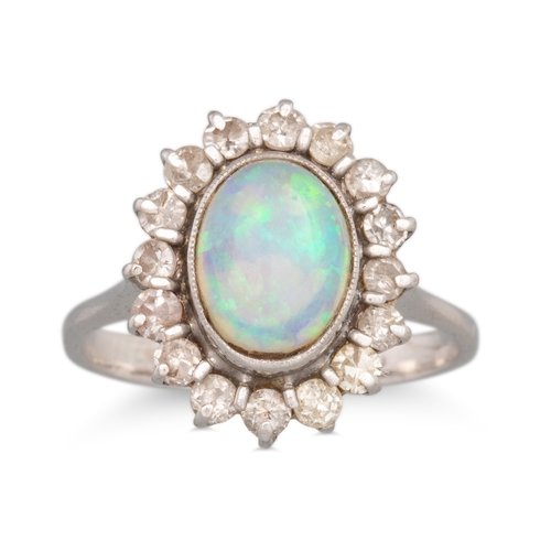 27 - AN OPAL AND DIAMOND CLUSTER RING, the oval opal to diamond surround, mounted in white gold, size L