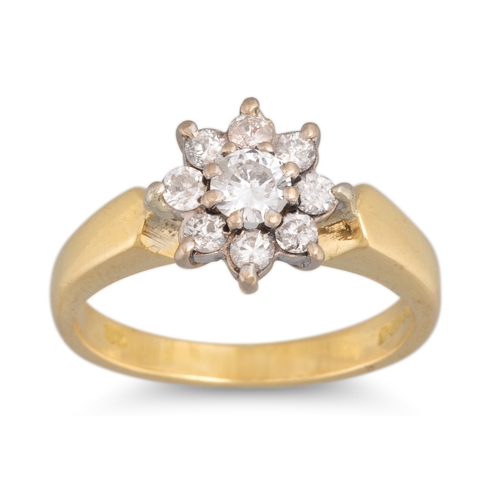 29 - A DIAMOND CLUSTER RING, mounted in 18ct yellow gold, size L