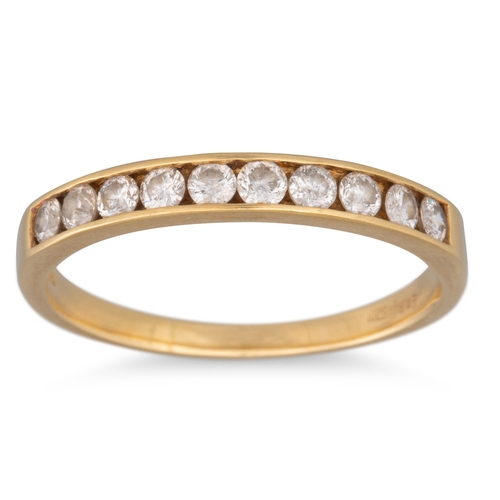 6 - A DIAMOND HALF ETERNITY RING, the ten round brilliant cut diamonds channel set in 18ct yellow gold, ... 