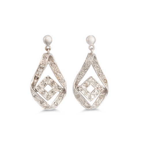 20 - A DIAMOND PENDANT, of shaped form, mounted in white gold, on a chain, together with matching earring... 