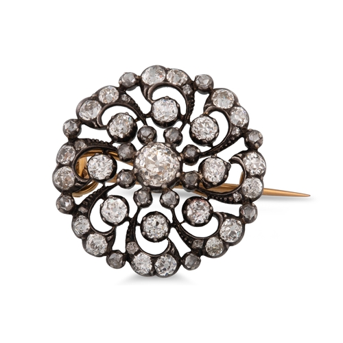 328 - AN ANTIQUE DIAMOND BROOCH, of circular cluster form, set with old and rose cut diamonds, mounted in ... 