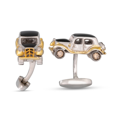 337 - A PAIR OF ONYX CUFFLINKS, modelled as motor cars, in 18ct white gold