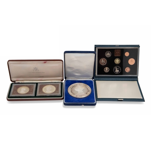 434 - A CASED 1983 UK PROOF COIN SET, a 1976 cased Republic of Liberia proof coin set, a cased 1976 Turks ... 