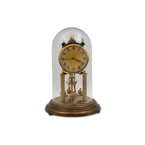 443 - A MID 20TH CENTURY BRASS FRAMED MANTLE CLOCK, circular dial with Roman numerals, over a circular bra... 