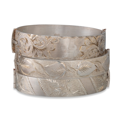 264 - FOUR STERLING SILVER BANGLES