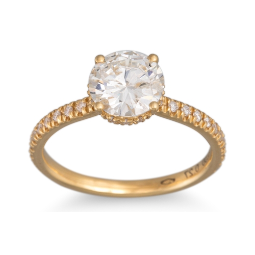 274 - A DIAMOND SOLITAIRE RING, the brilliant cut diamond to diamond shoulders and mount. Estimated weight... 