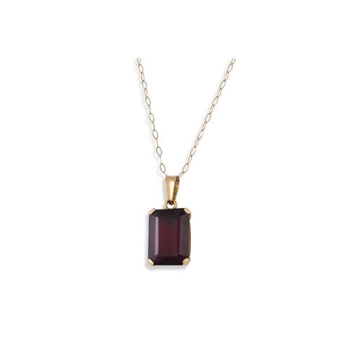 60 - A GARNET PENDANT, the rectangular cut garnet mounted in 14ct yellow gold, on a chain. Together with ... 