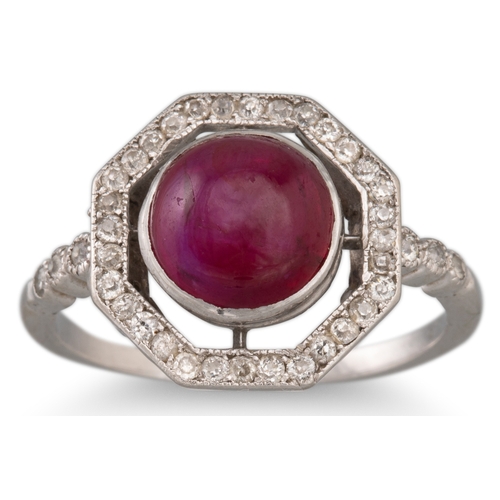 106 - AN ANTIQUE CABOCHON RUBY AND DIAMOND RING, central ruby to octagonal surround and diamond shoulders,... 