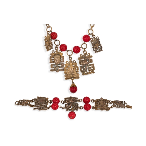 13 - A 1940'S EASTERN THEMED BRACELET AND NECKLACE SET, various motifs