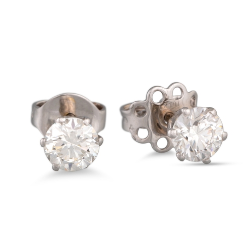 134 - A PAIR OF DIAMOND STUD EARRINGS, the brilliant cut diamonds mounted in 18ct white gold. Estimated: w... 