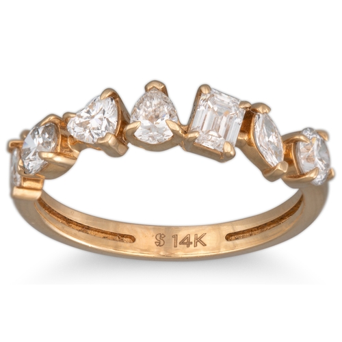 143 - A DIAMOND HALF ETERNITY RING, set with brilliant cut, baguette, pear and marquise stones, mounted in... 