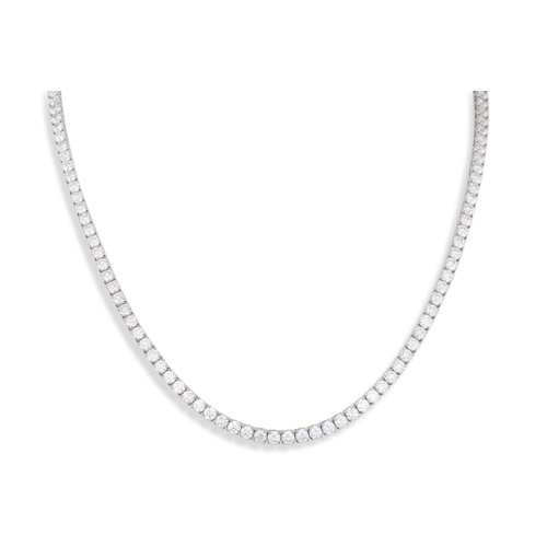 88 - A DIAMOND RIVIERE NECKLACE, the brilliant cut diamonds mounted in 18ct white gold. Together with an ... 