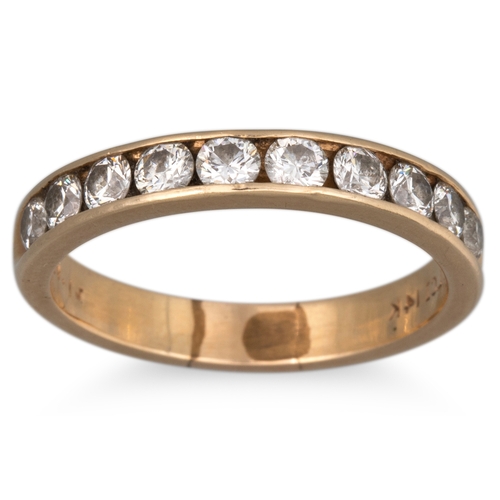 1 - A DIAMOND CHANNEL SET RING, mounted in 14ct gold. Estimated: weight of diamonds: 0.80 ct, size P-Q