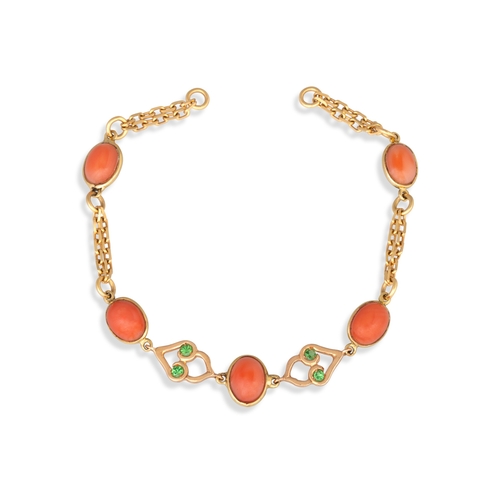 139 - A CABOCHON CORAL SET BRACELET, mounted in 18ct yellow gold