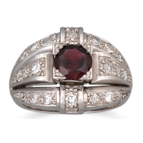 191 - A DIAMOND AND GARNET CLUSTER RING, the circular garnet to diamond surround, mounted in 18ct white go... 