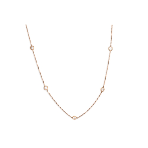 212 - A DIAMOND SET CHAIN, the collet set diamond linked by a 18ct rose gold chain. Estimated: weight of d... 