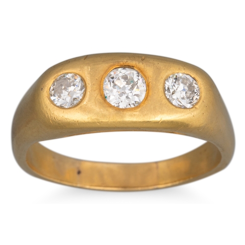 24 - A VICTORIAN THREE STONE DIAMOND RING, the old cut diamonds set in 18ct yellow gold. Estimated: weigh... 