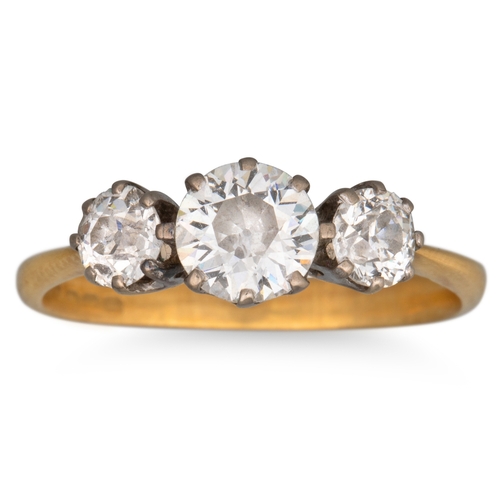 26 - A THREE STONE DIAMOND RING, the old cut diamonds, mounted in 18ct yellow gold and platinum. Estimate... 