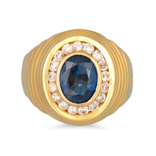 266 - A DIAMOND AND SAPPHIRE CLUSTER RING, the oval sapphire to a diamond surround, mounted in 18ct gold f... 