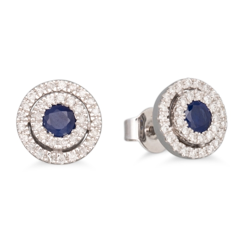 45 - A PAIR OF DIAMOND AND SAPPHIRE TARGET STYLE EARRINGS, the round sapphire to double diamond surrounds... 