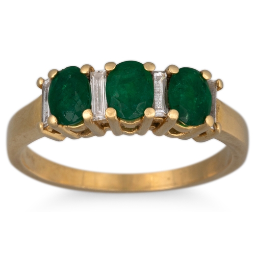 6 - AN EMERALD AND DIAMOND THREE STONE RING, mounted in 18ct gold, size O