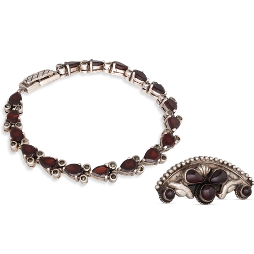 401 - A VINTAGE MARQUISE SILVER BRACELET, with garnets, together with a Victorian silver brooch