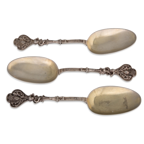 475 - A SET OF SIX HEAVY VICTORIAN SILVER SPOONS, highly decorated, London 1874, Edward Joseph, 358 g.