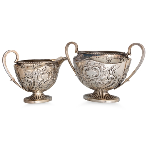 476 - A SILVER THREE PIECE VICTORIAN TEA SET, chased & engraved repoussé design, London 1898, West & Sons,... 