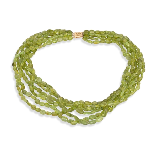 349 - A MULTI STRANDED PERIDOT BEADED NECKLACE, to a 14ct gold clasp