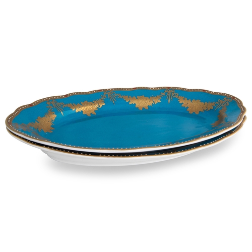 387 - A COLLECTION OF CERAMIC PLATES, two Japanese, one floral design and two French blue serving trays