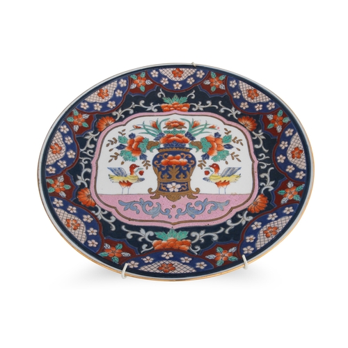 387 - A COLLECTION OF CERAMIC PLATES, two Japanese, one floral design and two French blue serving trays