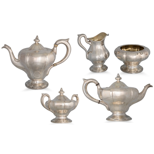 451 - AN ANTIQUE AMERICAN SILVER FIVE PIECE TEA AND COFFEE SERVICE, rococo revival, with gilt interior by ... 