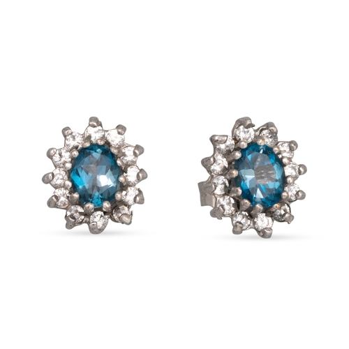 184 - A PAIR OF BLUE TOPAZ AND DIAMOND SET CLUSTER EARRINGS, mounted in gold