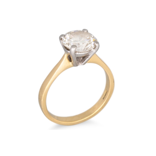 235 - A DIAMOND SOLITAIRE RING, the round brilliant cut diamond, mounted in 18ct yellow gold. Estimated: w... 