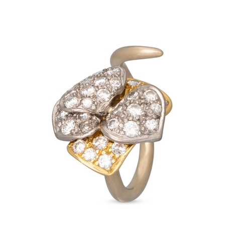 125 - A DIAMOND CLUSTER RING, pavé set in a floral arrangment, mounted in 18ct white and yellow gold. Esti... 