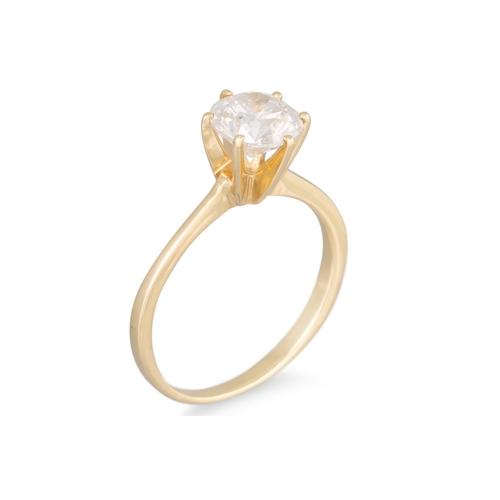 152 - A DIAMOND SOLITAIRE RING, mounted in yellow gold, the round brilliant cut diamond. Together with an ... 