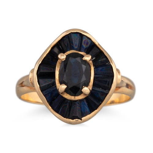 183 - A SUITE OF SAPPHIRE JEWELLERY, the oval sapphire cluster ring to sapphire surround, mounted in yello... 