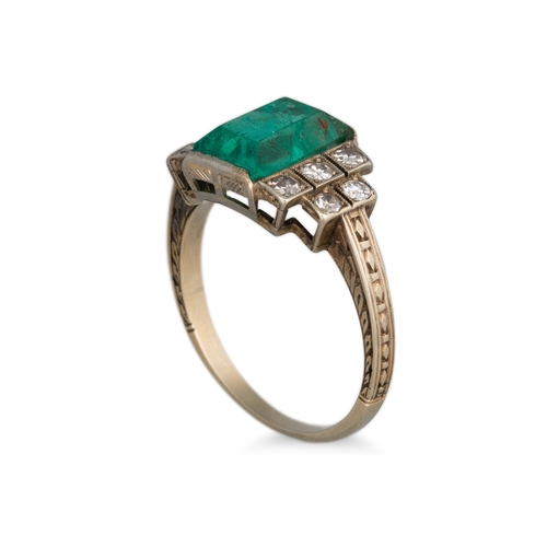 259 - A VINTAGE EMERALD AND DIAMOND SET RING, rectangular emerald to stepped diamond shoulders, in 18ct ye... 