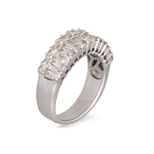 301 - A THREE ROWED DIAMOND RING, set with baguette and brilliant cut diamonds, mounted in 18ct white gold... 